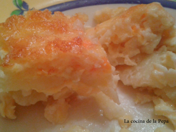 Patatas con leche, nata y queso al horno