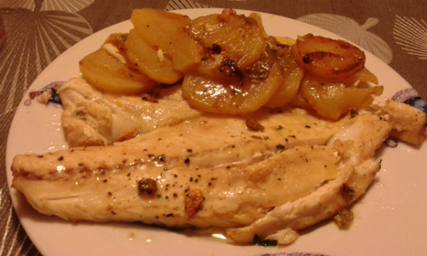 Lubina con patatas al horno